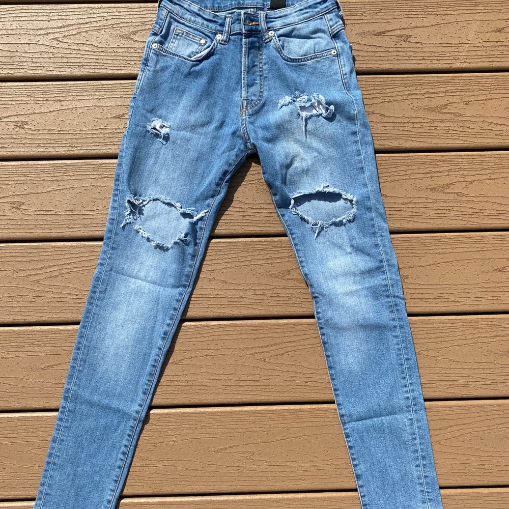 Distressed Blue Jeans